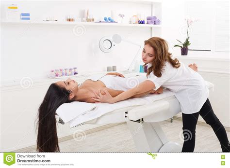 Woman Beautician Doctor Make Body Massage In Spa Wellness