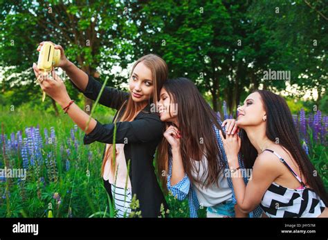 Three Hipsters Girls Blonde And Brunette Taking Self Portrait On