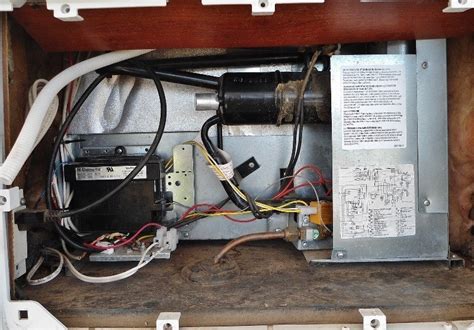 dometic dm rv refrigerator repair faulty electric heater element