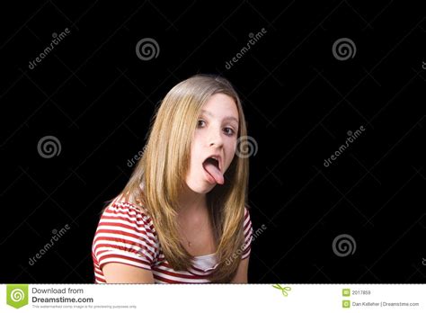 teen girl with tongue sticking out stock image image of tongue striped 2017859