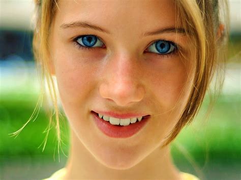 blond close up incredible blue eyes sweet girl face