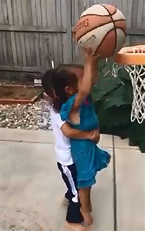 heartwarming moment brother encourages his little sister in basketball
