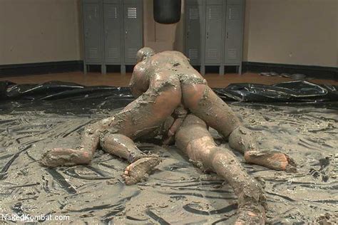 naked male mud wrestling with bondage and chastity at stake for the loser