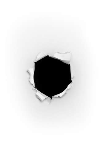 bullet hole  paper stock photo  image  istock
