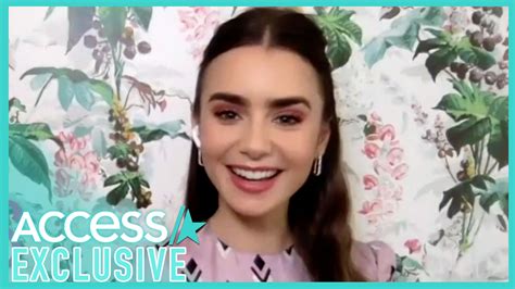 watch access hollywood interview lily collins reacts to