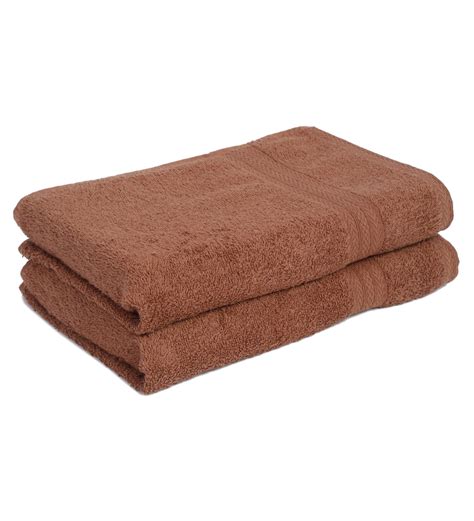 buy rust cotton solid  gsm bath towel set    naksh