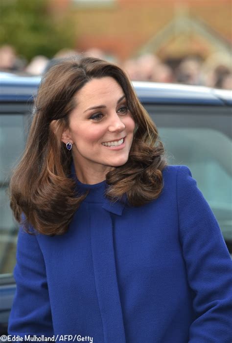 kate in a new blue goat fashion coat for action on