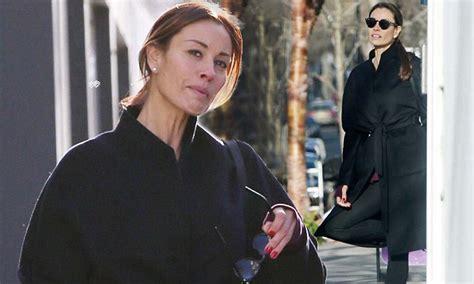 melanie sykes flaunts tiny waist in a belted black jacket daily mail online