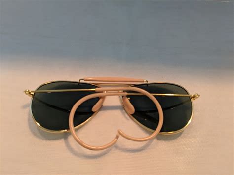 vintage small aviator sunglasses with cable ear pieces gold pink