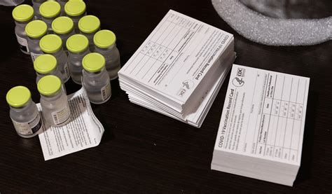 fake covid vaccine cards paper format open  outright fraud bloomberg