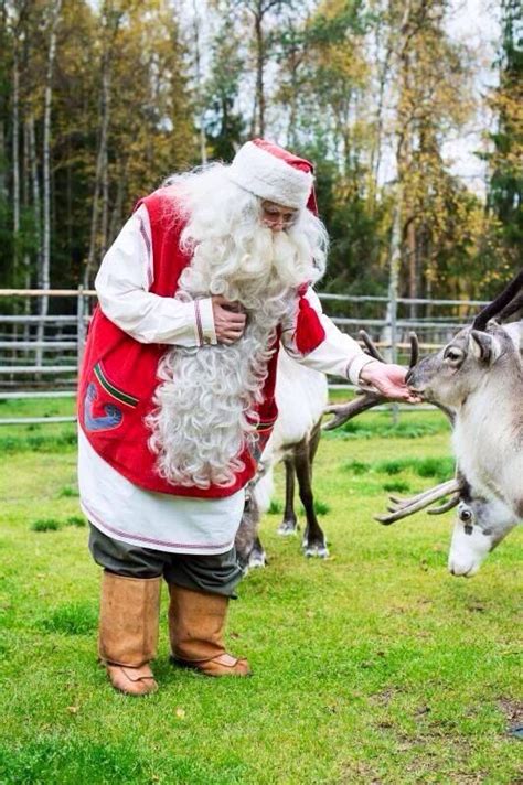 Santa Feeding His Reindeer Santa Claus Is Coming To Town Santa Claus