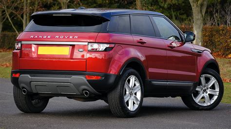red land rover range rover  stock photo