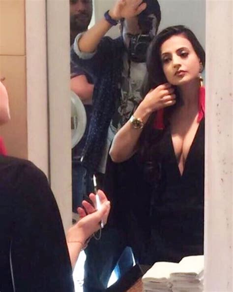 behind the scenes ameesha patel shares a picture of her getting ready for a photoshoot
