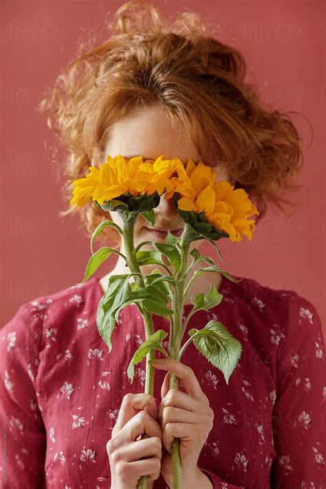 Ginger Woman With Sunflowers By Stocksy Contributor Danil Nevsky