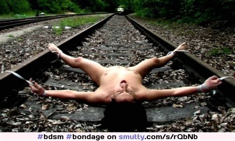 bdsm bondage spreadeagle public helpless watch out for old school villains traintracks