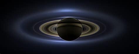 day  earth smiled saturn shines   amazing image   cassini team universe today