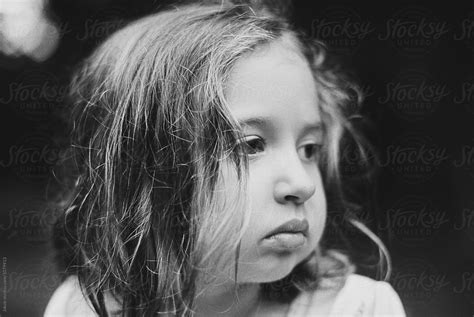 Close Up Portrait Of A Beautiful Young Girl In Black And White By