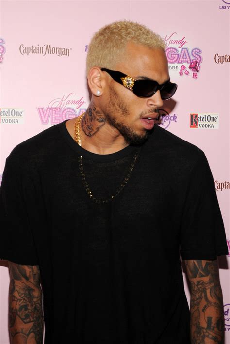 Chris Brown Shows Off Neck Tattoo But Denies It S Rihanna S Beaten Face