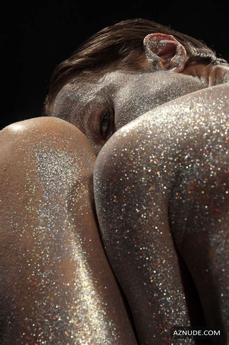 oksana chucha poses naked covered with glitter in a new photoshoot by