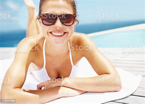 enjoying  sunbathing stock photo  image  adult adults  beach istock