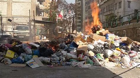 garbage piles   streets  government squabbles
