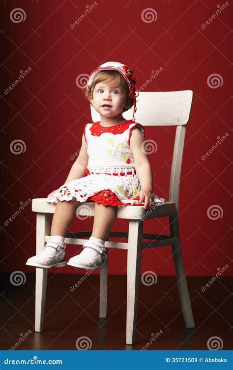 girl sitting  chair stock image image  person cute