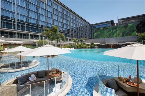 hilton manila officially  opens  unveils   staycation experience  leisure travelers