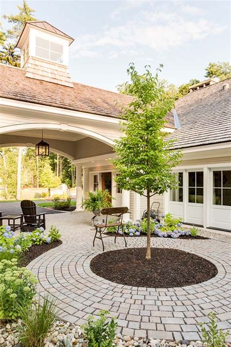 contemporary courtyard cottage infused  elegance  maine porte cochere front courtyard