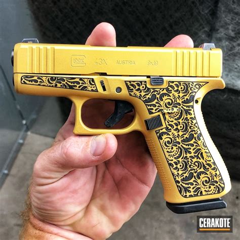laser engraved glock  coated  gold cerakote