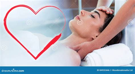 Composite Image Of Head Massage On Woman With Love Heart Stock