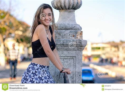 beautiful teenage girl wearing casual clothes outdoor