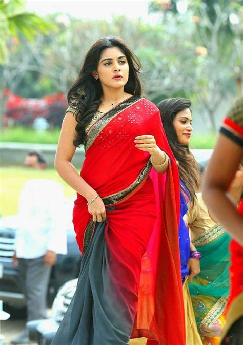 nivetha thomas in red saree new photoshoot stills indian filmy actress
