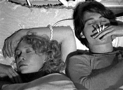 johnny as axel blackmar in bed with faye dunaway as elaine stalker in a