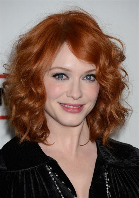 christina hendricks medium red curly hairstyle for mature