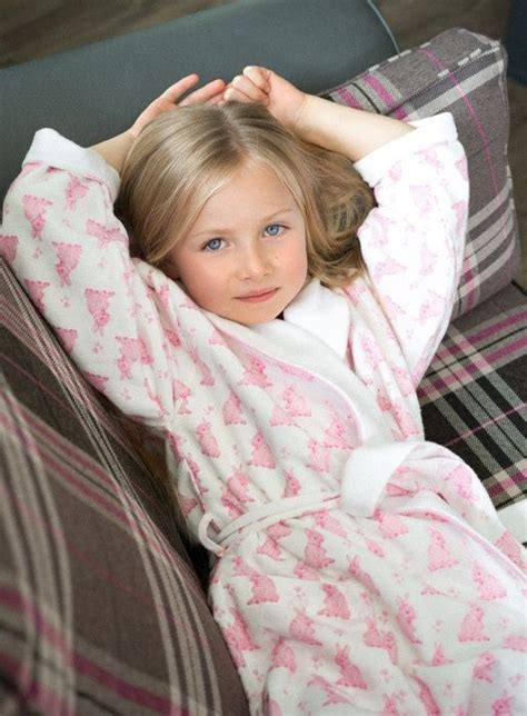 this soft brushed cotton bathrobe comes in a pretty pink bunny print