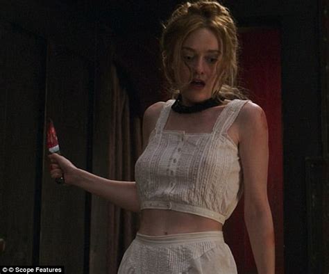 dakota fanning battles a face full of hair in gusty nyc daily mail online