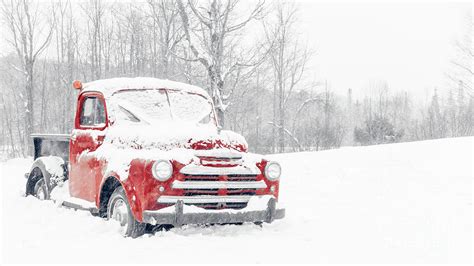 red american pickup truck   snowstorm photograph  edward