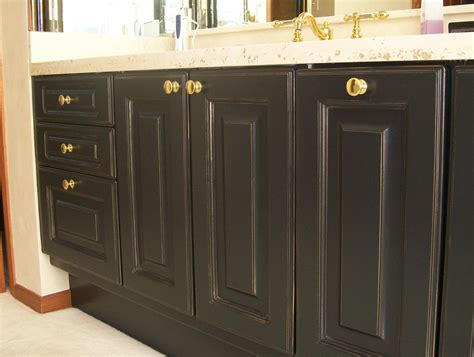 transforming stained oak cabinets  black beauties  gold touches