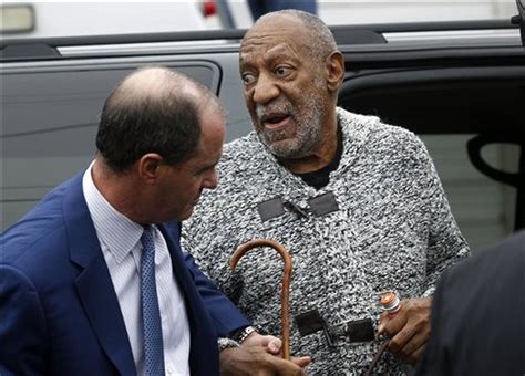 bill cosby charged with sexual assault in decade old case