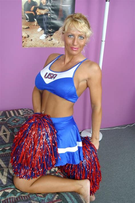 horny big tit blonde milf cheerleader posing and teasing pichunter
