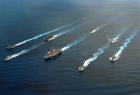 ships from the united states and canada navigate into formation
