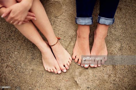 Close Up Of Barefoot Girls On Rock Photo Getty Images