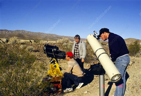 portrait of amateur astronomers and their telescopes stock image r104