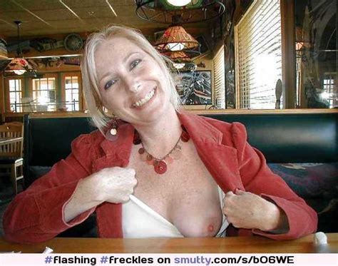 freckles public tits onetitsout milf restaurant flashing