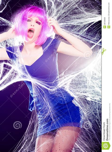 Woman With Purple Wig And Intense Make Up Trapped In A