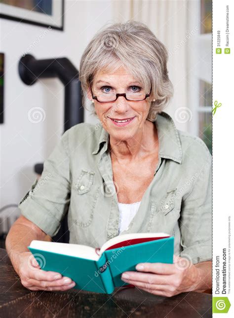 Attractive Elderly Woman Reading A Book Stock Image Image Of Book
