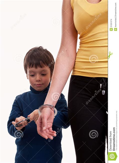mother and son playing cops and robbers chained w stock images image 31261274