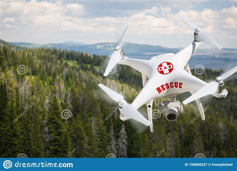 sar search  rescue unmanned aircraft system uas drone flying   mountain forest stock