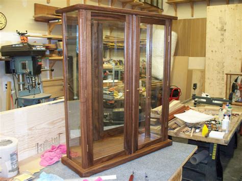 Wood And Glass Display Case With Double Doors Walnut