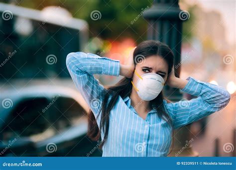 girl  mask covering  ears   noise pollution stock image image  emission